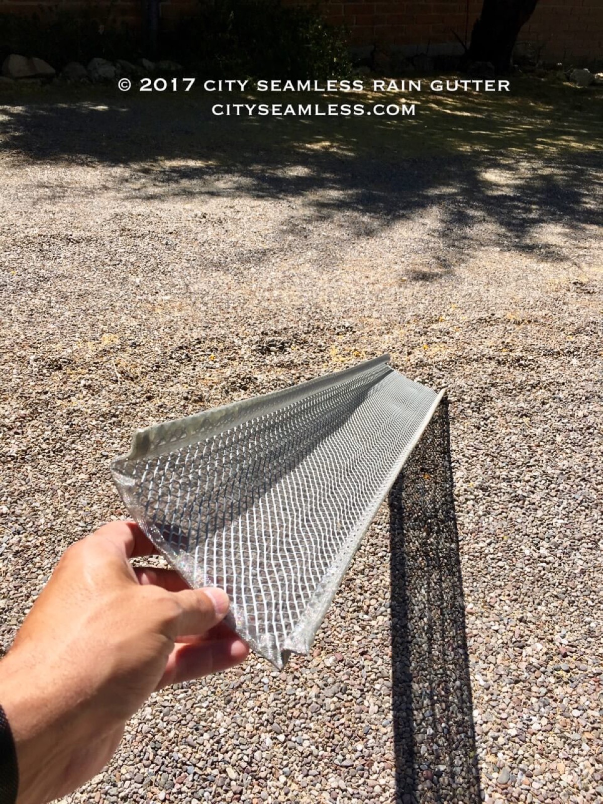 City Seamless leaf screen gutter guard detail.