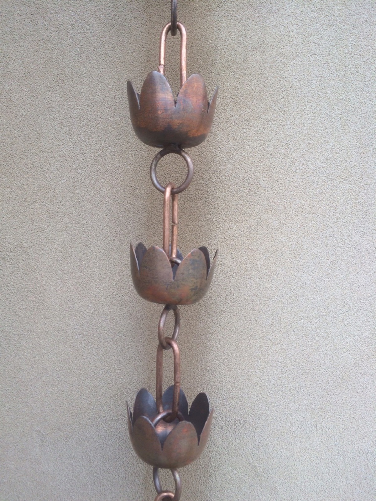 City Seamless rain chain detail for a custom gutter project.