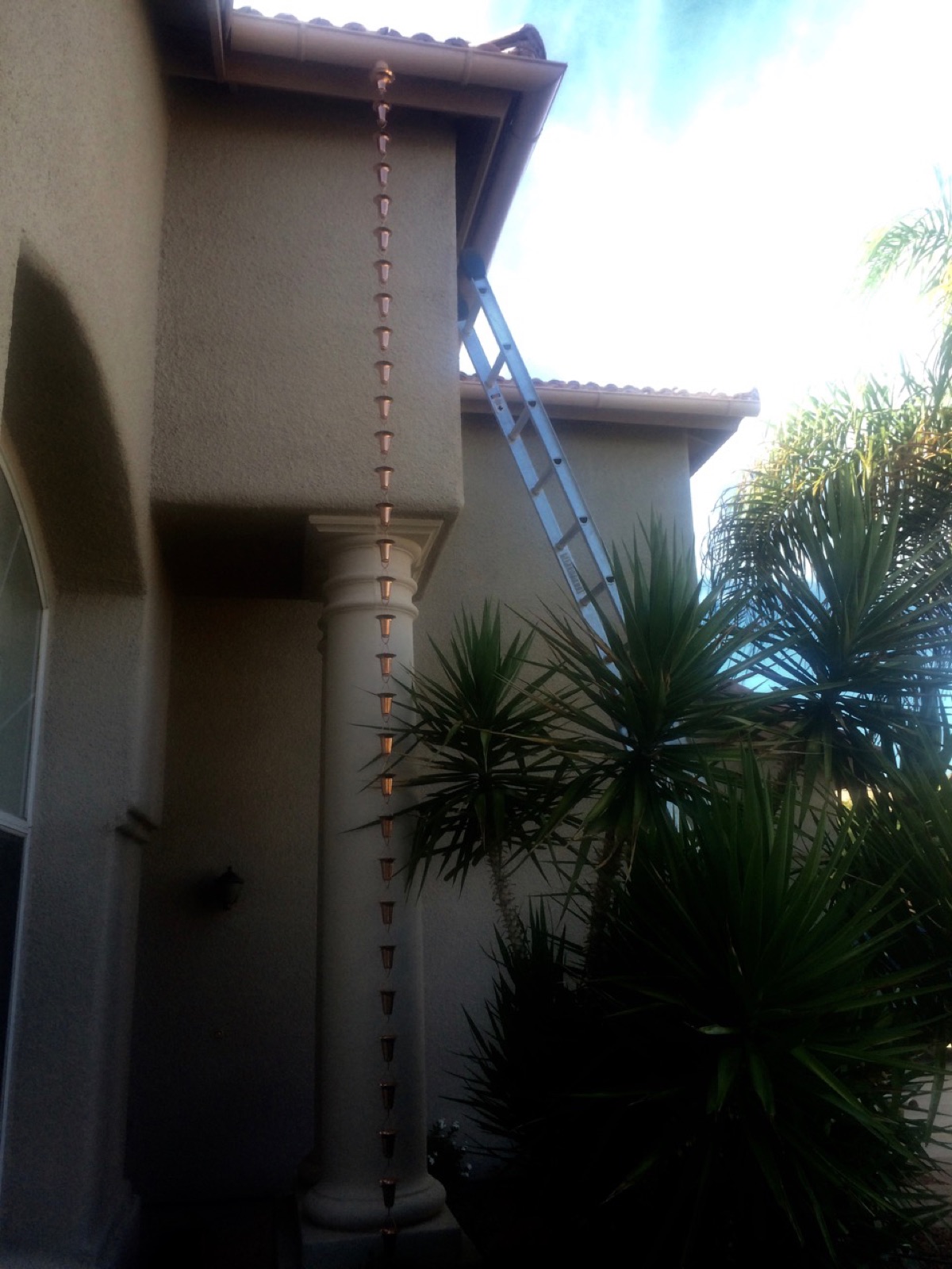City Seamless rain chain detail for a custom gutter project.