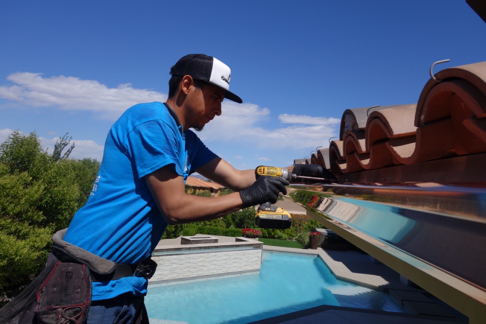 City Seamless rain gutter installation crew and equipment photo.