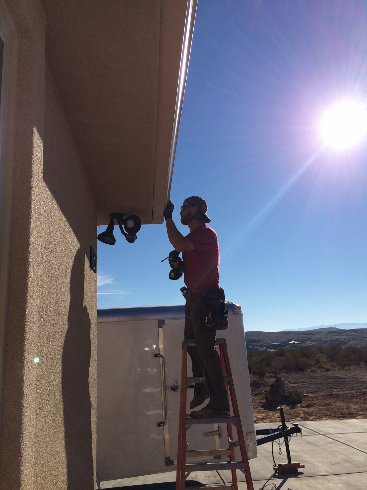 City Seamless rain gutter installation crew and equipment photo.
