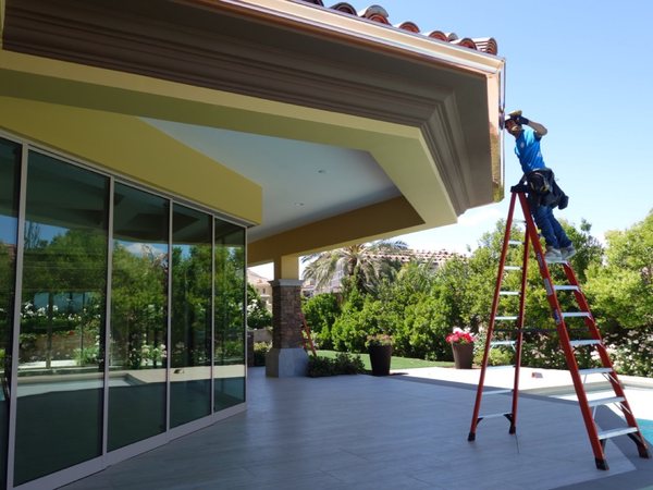 City Seamless rain gutter installation crew and equipment photo.