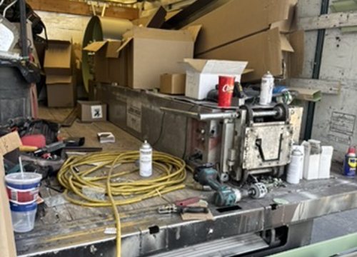 City Seamless rain gutter installation crew and equipment photo.